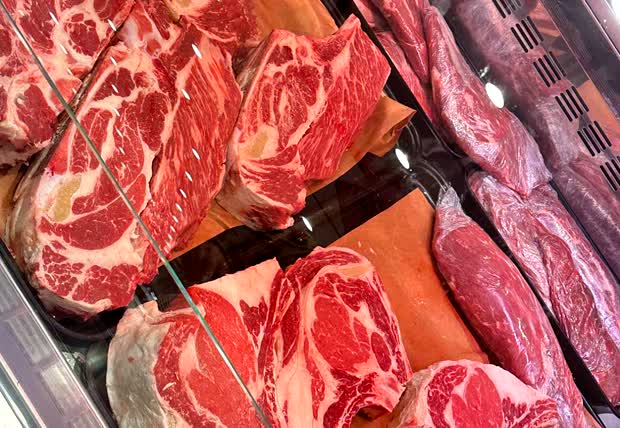 Fresh cuts of beef at the butcher counter